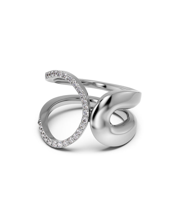 Silver ring with diamond accents on a white background